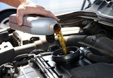 topping up engine oil